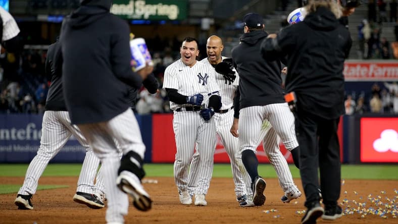 May 3, 2023; Bronx, New York, USA; New York Yankees pinch hitter Jose Trevino (39) celebrates his tenth inning walkoff RBI single against the Cleveland Guardians with teammates at Yankee Stadium. Mandatory Credit: Brad Penner-USA TODAY Sports