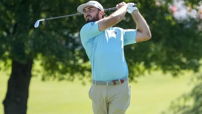 May 4, 2023; Charlotte, North Carolina, USA; Max Homa hits his second shot on the third hole during the first round of the Wells Fargo Championship golf tournament. Mandatory Credit: Jim Dedmon-USA TODAY Sports