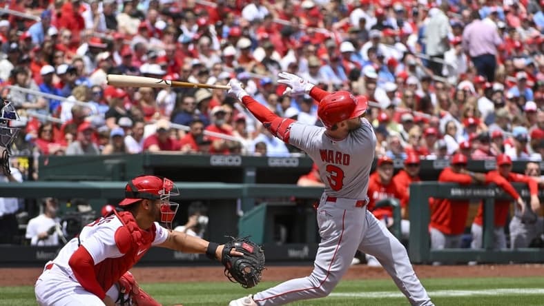 May 4, 2023; St. Louis, Missouri, USA;  Los Angeles Angels left fielder Taylor Ward (3) hits a one run sacrifice fly against the St. Louis Cardinals during the third inning at Busch Stadium. Mandatory Credit: Jeff Curry-USA TODAY Sports