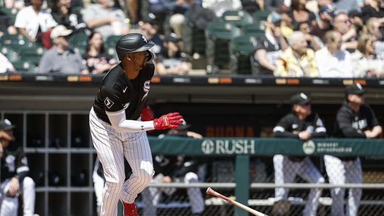 May 4, 2023; Chicago, Illinois, USA; Chicago White Sox designated hitter Eloy Jimenez (74) watches his two-run home run against the Minnesota Twins during the third inning at Guaranteed Rate Field. Mandatory Credit: Kamil Krzaczynski-USA TODAY Sports