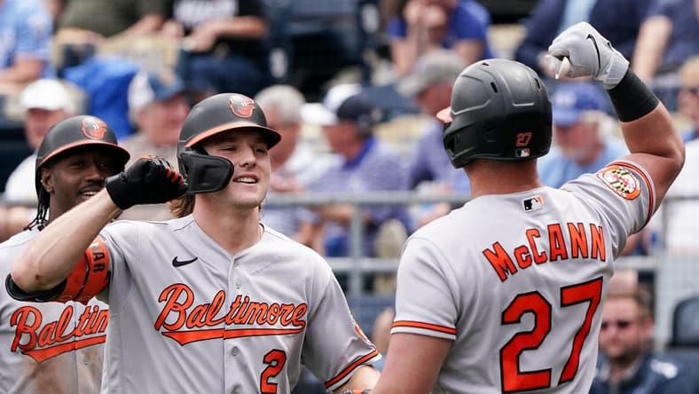 May 4, 2023; Kansas City, Missouri, USA; Baltimore Orioles third baseman Gunnar Henderson (2) celebrates with catcher James McCann (27) against the Kansas City Royals after hitting a two run home run in the third inning at Kauffman Stadium. Mandatory Credit: Denny Medley-USA TODAY Sports