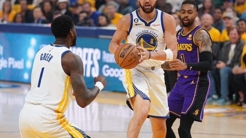 May 4, 2023; San Francisco, California, USA; Golden State Warriors guard Klay Thompson (11) holds onto a rebound against the Los Angeles Lakers in the first quarter during game two of the 2023 NBA playoffs at the Chase Center. Mandatory Credit: Cary Edmondson-USA TODAY Sports