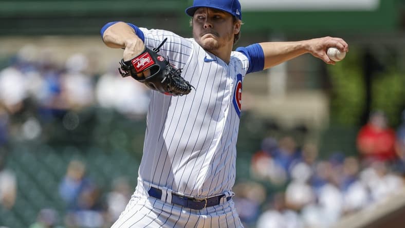 May 5, 2023; Chicago, Illinois, USA; Chicago Cubs starting pitcher Justin Steele (35) pitches against the Miami Marlins during the first inning at Wrigley Field. Mandatory Credit: Kamil Krzaczynski-USA TODAY Sports