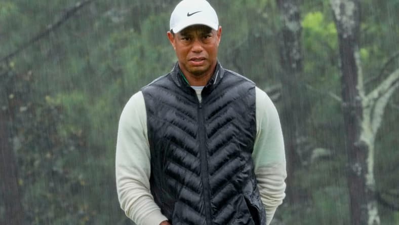 Tiger Woods prepares to putt on the 18th green during the second round of The Masters.