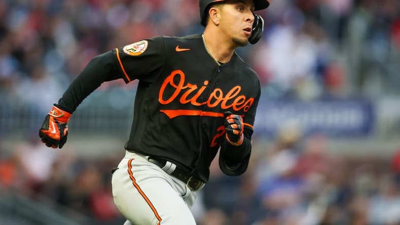 May 5, 2023; Atlanta, Georgia, USA; Baltimore Orioles second baseman Ramon Urias (29) hits a single against the Atlanta Braves in the second inning at Truist Park. Mandatory Credit: Brett Davis-USA TODAY Sports