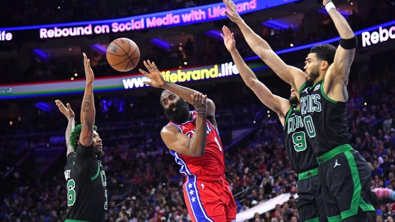 May 5, 2023; Philadelphia, Pennsylvania, USA; Philadelphia 76ers guard James Harden (1) passes the ball against Boston Celtics guard Marcus Smart (36), guard Derrick White (9) and forward Jayson Tatum (0) during the second quarter of game three of the 2023 NBA playoff at Wells Fargo Center. Mandatory Credit: Eric Hartline-USA TODAY Sports