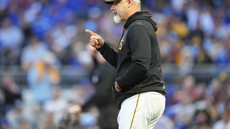 May 5, 2023; Pittsburgh, Pennsylvania, USA; Pittsburgh Pirates manager Derek Shelton (17) signals for a pitching change during the sixth inning against the Toronto Blue Jays at PNC Park. Mandatory Credit: Gregory Fisher-USA TODAY Sports