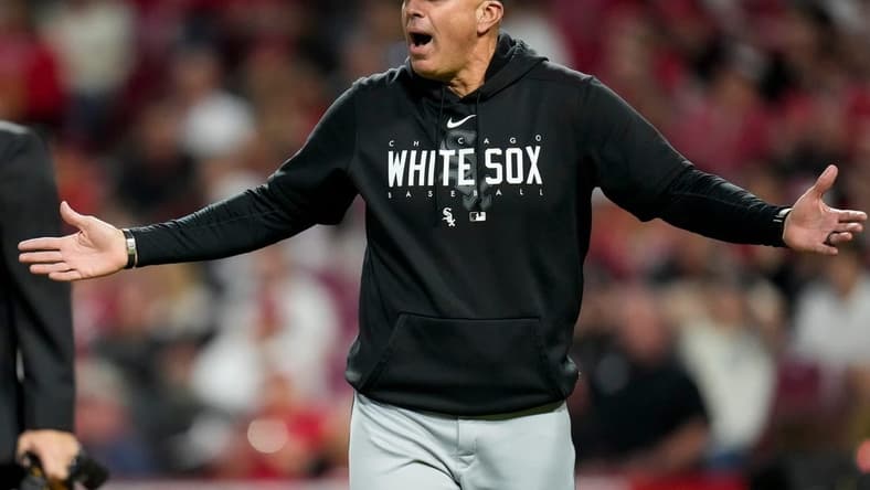 Chicago White Sox manager Pedro Grifol (5) shouts down to crew chief Todd Tichenor (13) after arguing umpire Brian Knight (91) over a balk called on relief pitcher Joe Kelly in the seventh inning of the MLB Interleague game between the Cincinnati Reds and the Chicago White Sox at Great American Ball Park in downtown Cincinnati on Friday, May 5, 2023. The Reds lost the opening game of the series, 5-4.