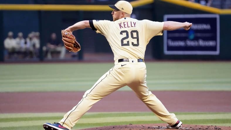 May 5, 2023; Phoenix, Arizona, USA; Arizona Diamondbacks starting pitcher Merrill Kelly (29) pitches against the Washington Nationals during the first inning at Chase Field. Mandatory Credit: Joe Camporeale-USA TODAY Sports