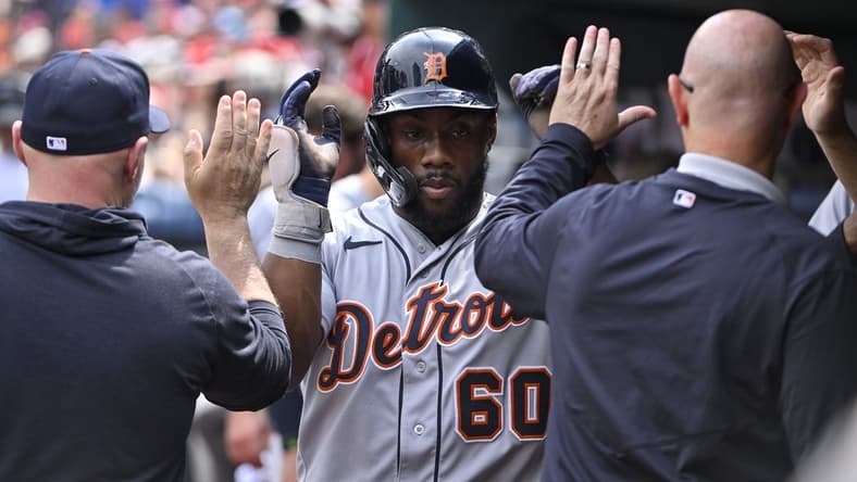 May 6, 2023; St. Louis, Missouri, USA; Detroit Tigers left fielder Akil Baddoo (60) is congratulated by teammates after scoring against the St. Louis Cardinals during the fifth inning at Busch Stadium. Mandatory Credit: Jeff Curry-USA TODAY Sports