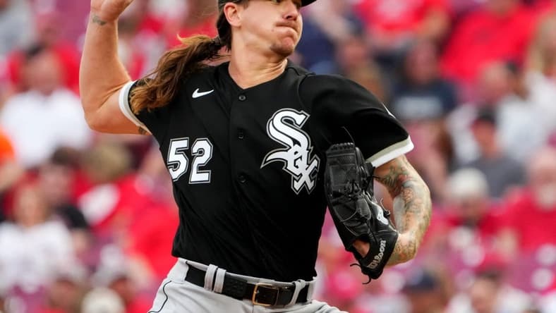Chicago White Sox starting pitcher Mike Clevinger (52) delivers in the second inning during a baseball game between the Chicago White Sox and the Cincinnati Reds, Saturday, May 6, 2023, at Great American Ball Park in Cincinnati.