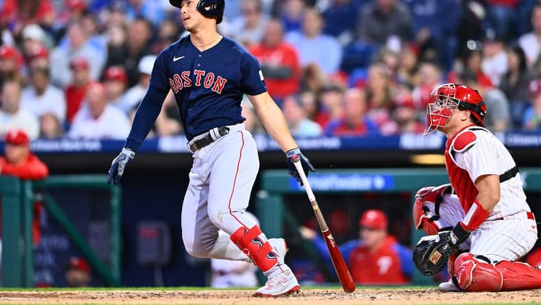 May 6, 2023; Philadelphia, Pennsylvania, USA; Boston Red Sox outfielder Rob Refsnyder (30) hits a single against the Philadelphia Phillies in the fourth inning at Citizens Bank Park. Mandatory Credit: Kyle Ross-USA TODAY Sports