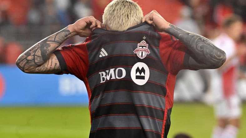May 6, 2023; Toronto, Ontario, CAN;  Toronto FC midfielder Federico Bernardeschi (10) pulls his shirt over his face after a 2-0 defeat against the New England Revolution at BMO Field. Mandatory Credit: Dan Hamilton-USA TODAY Sports