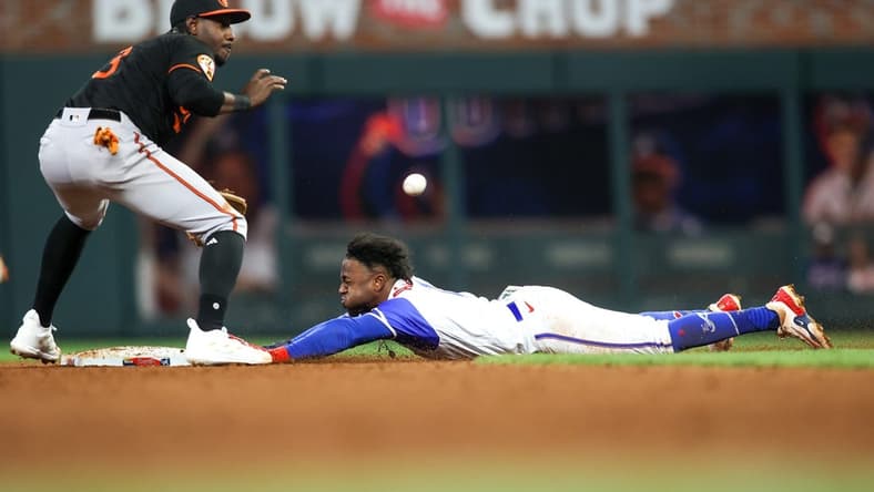 May 6, 2023; Atlanta, Georgia, USA; Atlanta Braves second baseman Ozzie Albies (1) steals second base against the Baltimore Orioles in the eighth inning at Truist Park. Mandatory Credit: Brett Davis-USA TODAY Sports