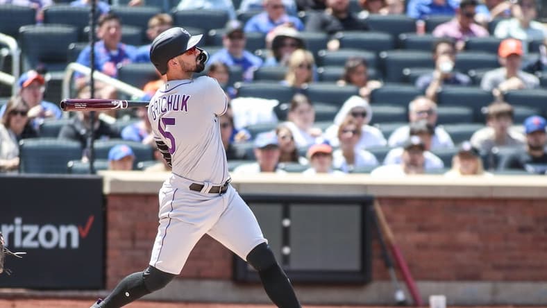 May 7, 2023; New York City, New York, USA; Colorado Rockies designated hitter Randal Grichuk (15) hits a home run in the first inning against the New York Mets at Citi Field. Mandatory Credit: Wendell Cruz-USA TODAY Sports