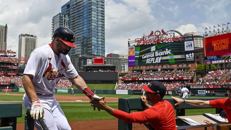 May 7, 2023; St. Louis, Missouri, USA; St. Louis Cardinals first baseman Paul Goldschmidt (46) is congratulated by manager Oliver Marmol (37) after hitting a solo home run against the Detroit Tigers during the third inning at Busch Stadium. Mandatory Credit: Jeff Curry-USA TODAY Sports