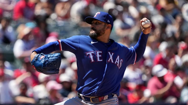 May 7, 2023; Anaheim, California, USA; Texas Rangers starting pitcher Martin Perez (54) throws in the fourth inning against the Los Angeles Angels at Angel Stadium. Mandatory Credit: Kirby Lee-USA TODAY Sports