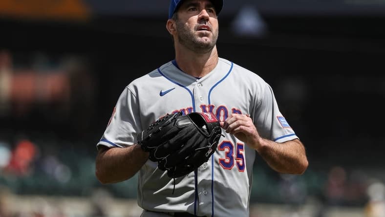 Mets pitcher Justin Verlander walks off the field after pitching against the Tigers during the third inning at Comerica Park on Thursday, May 4, 2023.