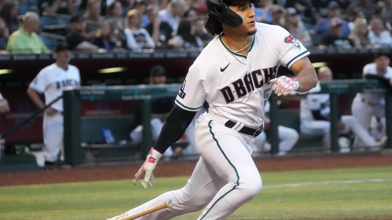 Arizona Diamondbacks Alek Thomas (5) hits a triple against the Washington Nationals at Chase Field on May 6, 2023.