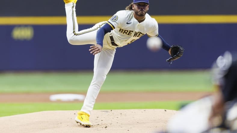 May 8, 2023; Milwaukee, Wisconsin, USA; Milwaukee Brewers pitcher Freddy Peralta (51) throws a pitch during the first inning against the Los Angeles Dodgers at American Family Field. Mandatory Credit: Jeff Hanisch-USA TODAY Sports