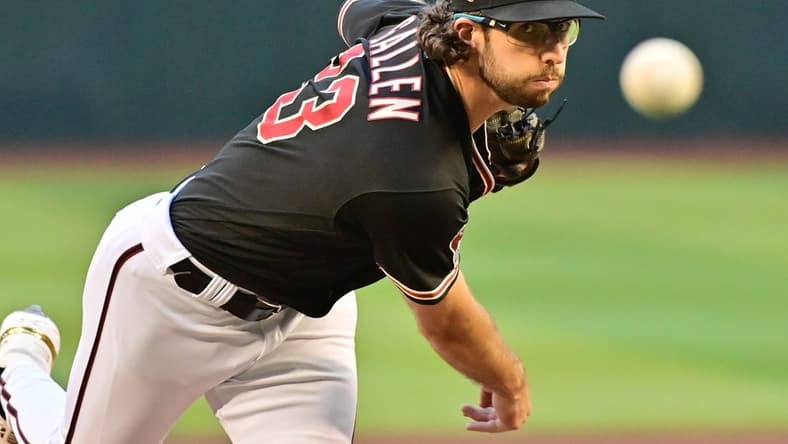 May 8, 2023; Phoenix, Arizona, USA; Arizona Diamondbacks starting pitcher Zac Gallen (23) throws in the first inning against the Miami Marlins at Chase Field. Mandatory Credit: Matt Kartozian-USA TODAY Sports