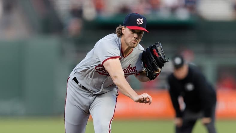 May 8, 2023; San Francisco, California, USA; Washington Nationals starting pitcher Jake Irvin (74) throws against the San Francisco Giants during the third inning at Oracle Park. Mandatory Credit: John Hefti-USA TODAY Sports