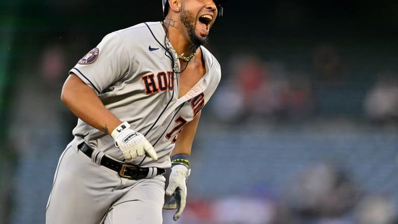 May 8, 2023; Anaheim, California, USA; Houston Astros first baseman Jose Abreu (79) smiles as he advances to third on a fielding error by Los Angeles Angels right fielder Hunter Renfroe (12) in the third inning at Angel Stadium. Mandatory Credit: Jayne Kamin-Oncea-USA TODAY Sports