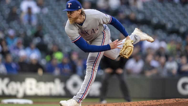 May 8, 2023; Seattle, Washington, USA; Texas Rangers starter Jon Gray (22) delivers a pitch during the second inning against the Seattle Mariners at T-Mobile Park. Mandatory Credit: Stephen Brashear-USA TODAY Sports