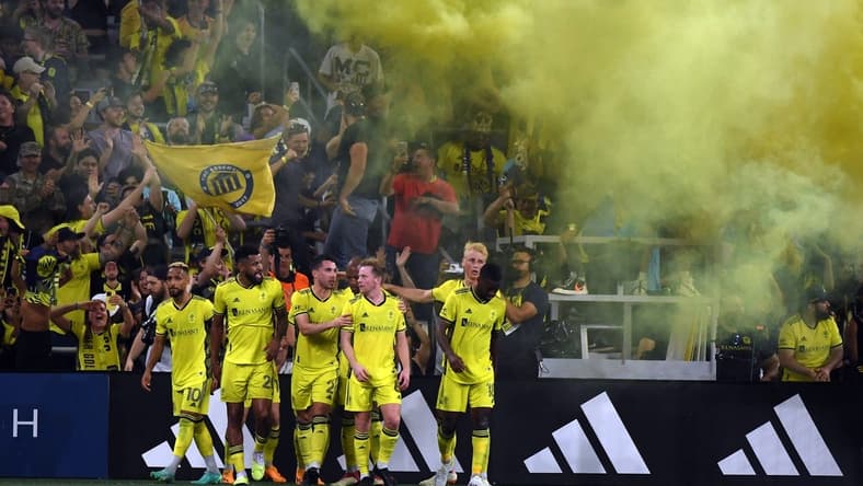 May 6, 2023; Nashville, Tennessee, USA; Nashville SC players celebrate after a goal by midfielder Hany Mukhtar (10) during the first half against the Chicago Fire at Geodis Park. Mandatory Credit: Christopher Hanewinckel-USA TODAY Sports