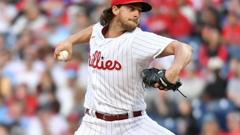 May 9, 2023; Philadelphia, Pennsylvania, USA; Philadelphia Phillies starting pitcher Aaron Nola (27) throws a pitch during the third inning against the Toronto Blue Jays at Citizens Bank Park. Mandatory Credit: Eric Hartline-USA TODAY Sports