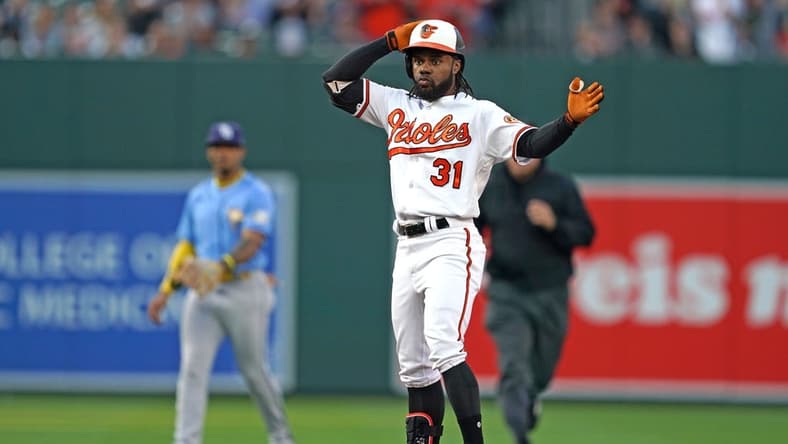 May 9, 2023; Baltimore, Maryland, USA; Baltimore Orioles outfielder Cedric Mullins (31) reacts following his double in the third inning against the Tampa Bay Rays at Oriole Park at Camden Yards. Mandatory Credit: Mitch Stringer-USA TODAY Sports