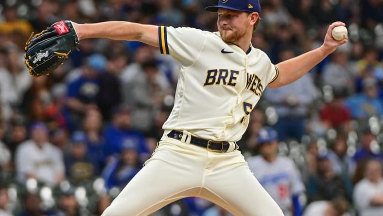 May 9, 2023; Milwaukee, Wisconsin, USA; Milwaukee Brewers pitcher Eric Lauer (52) pitches against the Los Angeles Dodgers in the first inning at American Family Field. Mandatory Credit: Benny Sieu-USA TODAY Sports