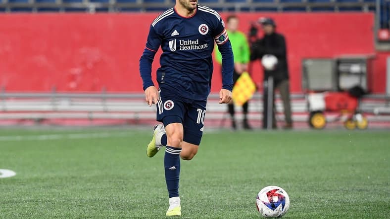 May 9, 2023; Foxborough, MA, USA; New England Revolution midfielder Carles Gil (10) dribbles the ball during the second half at Gillette Stadium. Mandatory Credit: Eric Canha-USA TODAY Sports