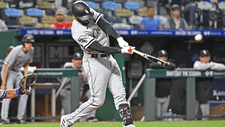 May 9, 2023; Kansas City, Missouri, USA; Chicago White Sox center fielder Luis Robert Jr. (88) hits a solo home run during the fourth inning against the Kansas City Royals at Kauffman Stadium. Mandatory Credit: Peter Aiken-USA TODAY Sports