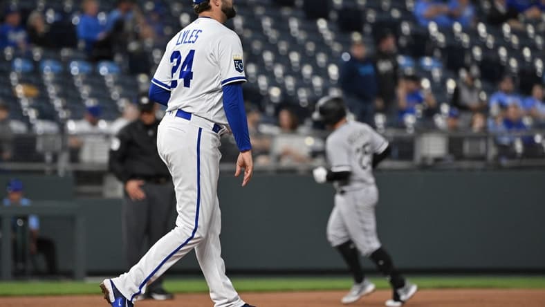May 9, 2023; Kansas City, Missouri, USA; Kansas City Royals starting pitcher Jordan Lyles (24) reacts after giving up a two run home run to Chicago White Sox first baseman Andrew Vaughn (25) during the sixth inning at Kauffman Stadium. Mandatory Credit: Peter Aiken-USA TODAY Sports