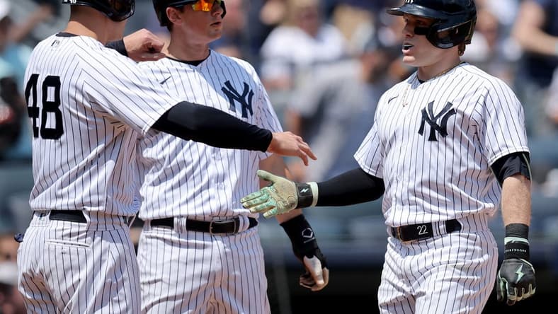 May 10, 2023; Bronx, New York, USA; New York Yankees center fielder Harrison Bader (22) celebrates his three run home run against the Oakland Athletics with first baseman Anthony Rizzo (48) and third baseman DJ LeMahieu (26) during the first inning at Yankee Stadium. Mandatory Credit: Brad Penner-USA TODAY Sports