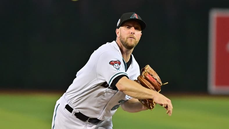 May 10, 2023; Phoenix, Arizona, USA; Arizona Diamondbacks starting pitcher Merrill Kelly (29) throws in the first inning against the Miami Marlins at Chase Field. Mandatory Credit: Matt Kartozian-USA TODAY Sports