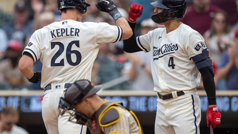 May 10, 2023; Minneapolis, Minnesota, USA; Minnesota Twins right fielder Max Kepler (26) celebrates with shortstop Carlos Correa (4) after hitting a solo home run in the first inning against the San Diego Padres at Target Field. Mandatory Credit: Jesse Johnson-USA TODAY Sports