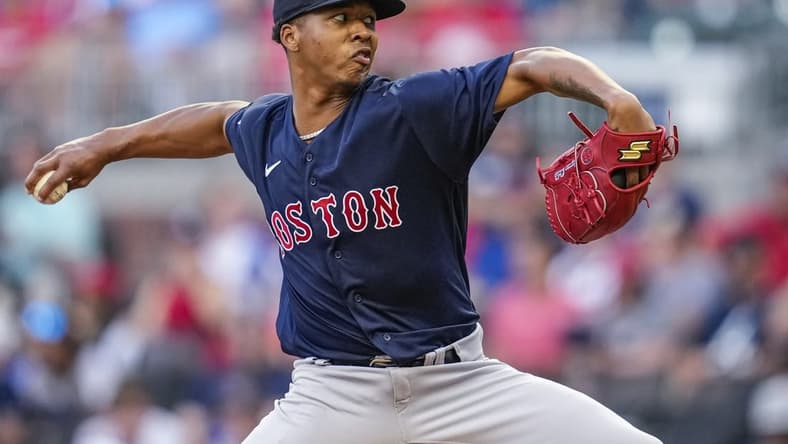 May 10, 2023; Cumberland, Georgia, USA; Boston Red Sox starting pitcher Brayan Bello (66) pitches against the Atlanta Braves during the first inning at Truist Park. Mandatory Credit: Dale Zanine-USA TODAY Sports