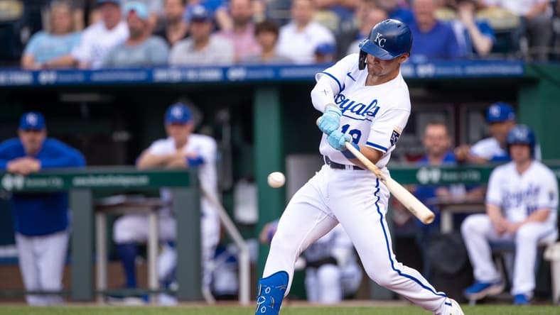 May 10, 2023; Kansas City, Missouri, USA; Kansas City Royals second baseman Michael Massey (19) gets a hit during the first inning against the Chicago White Sox at Kauffman Stadium. Mandatory Credit: William Purnell-USA TODAY Sports