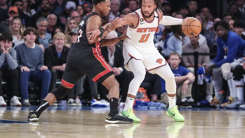 May 10, 2023; New York, New York, USA; New York Knicks guard Jalen Brunson (11) looks to drive past Miami Heat guard Kyle Lowry (7) during game five of the 2023 NBA playoffs at Madison Square Garden. Mandatory Credit: Wendell Cruz-USA TODAY Sports