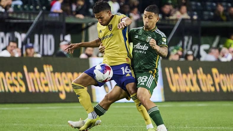 May 10, 2023; Portland, OR, USA; Real Salt Lake midfielder Maikel Chang (16) controls the ball during the second half against Portland Timbers defender Pablo Bonilla (28) at Providence Park. Mandatory Credit: Troy Wayrynen-USA TODAY Sports