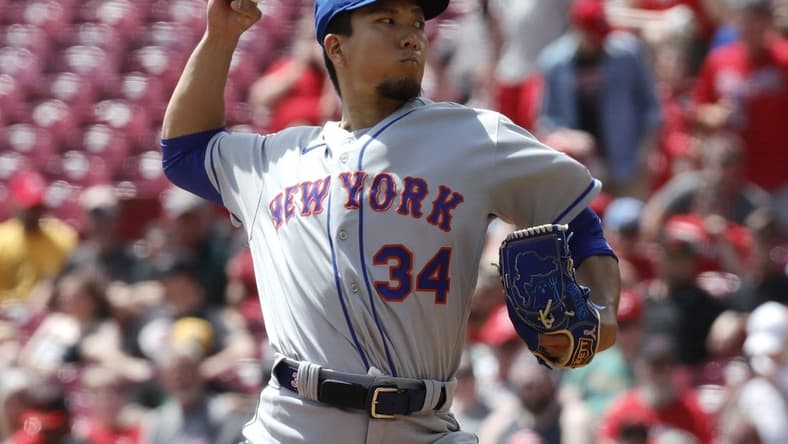 May 11, 2023; Cincinnati, Ohio, USA; New York Mets starting pitcher Kodai Senga (34) throws against the Cincinnati Reds during the first inning at Great American Ball Park. Mandatory Credit: David Kohl-USA TODAY Sports