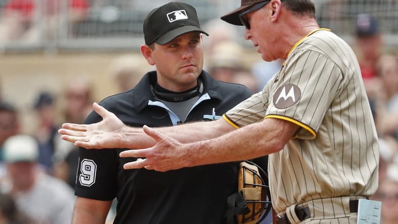 May 11, 2023; Minneapolis, Minnesota, USA; San Diego Padres manager Bob Melvin speaks with home plate umpire Brock Ballou in the eighth inning of the game with the Minnesota Twins at Target Field. Mandatory Credit: Bruce Kluckhohn-USA TODAY Sports