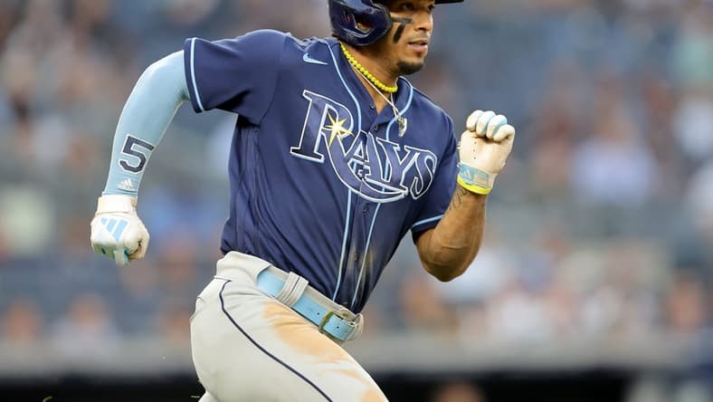 May 11, 2023; Bronx, New York, USA; Tampa Bay Rays shortstop Wander Franco (5) runs to first after hitting a single against the New York Yankees during the third inning at Yankee Stadium. Mandatory Credit: Brad Penner-USA TODAY Sports