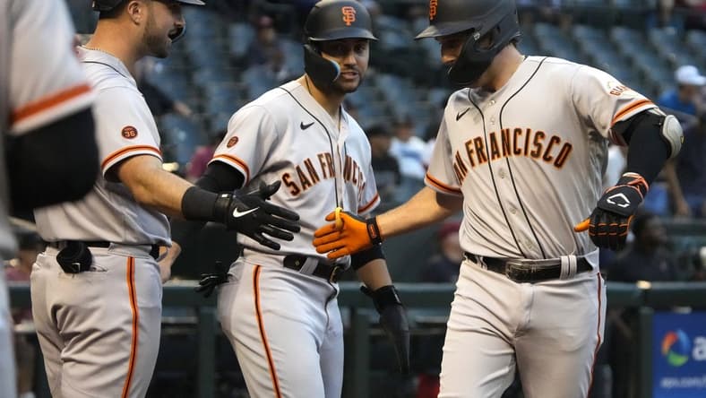 May 11, 2023; Phoenix, Arizona, USA; San Francisco Giants third baseman Casey Schmitt (6) celebrates with teammates after hitting a two-run home run against the Arizona Diamondbacks in the second inning at Chase Field. Mandatory Credit: Rick Scuteri-USA TODAY Sports