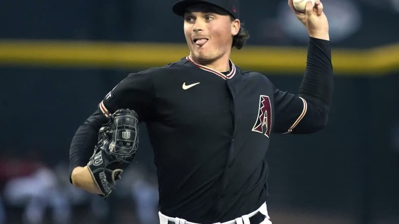 May 11, 2023; Phoenix, Arizona, USA; Arizona Diamondbacks starting pitcher Tommy Henry (47) throws against the San Francisco Giants in the first inning at Chase Field. Mandatory Credit: Rick Scuteri-USA TODAY Sports
