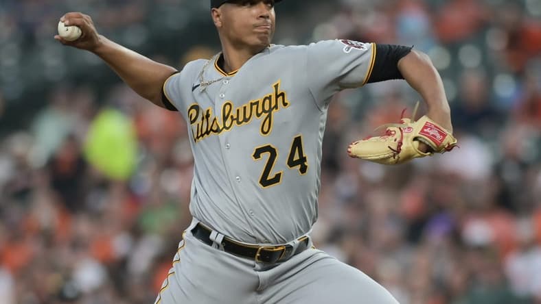 May 12, 2023; Baltimore, Maryland, USA; Pittsburgh Pirates starting pitcher Johan Oviedo (24) throws a third inning pitch against the Baltimore Orioles at Oriole Park at Camden Yards. Mandatory Credit: Tommy Gilligan-USA TODAY Sports