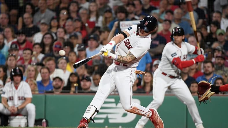 May 12, 2023; Boston, Massachusetts, USA; Boston Red Sox center fielder Jarren Duran (16) hits a two-RBI single during the fourth inning against the St. Louis Cardinals at Fenway Park. Mandatory Credit: Eric Canha-USA TODAY Sports