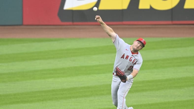 May 12, 2023; Cleveland, Ohio, USA; Los Angeles Angels center fielder Mike Trout (27) throws the ball to the infield in the second inning against the Cleveland Guardians at Progressive Field. Mandatory Credit: David Richard-USA TODAY Sports